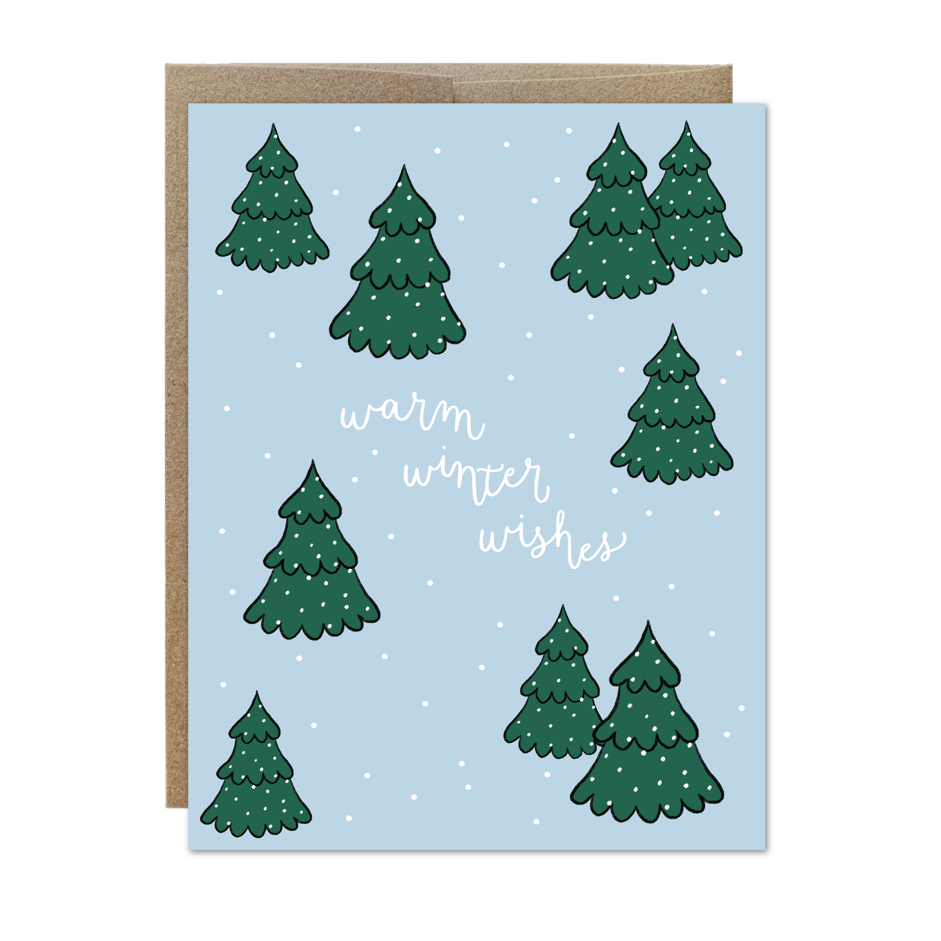 Light blue greeting card with hand lettered words "warm winter wishes", snowflakes, and snow covered pine trees throughout. Paired with Kraft brown envelope.