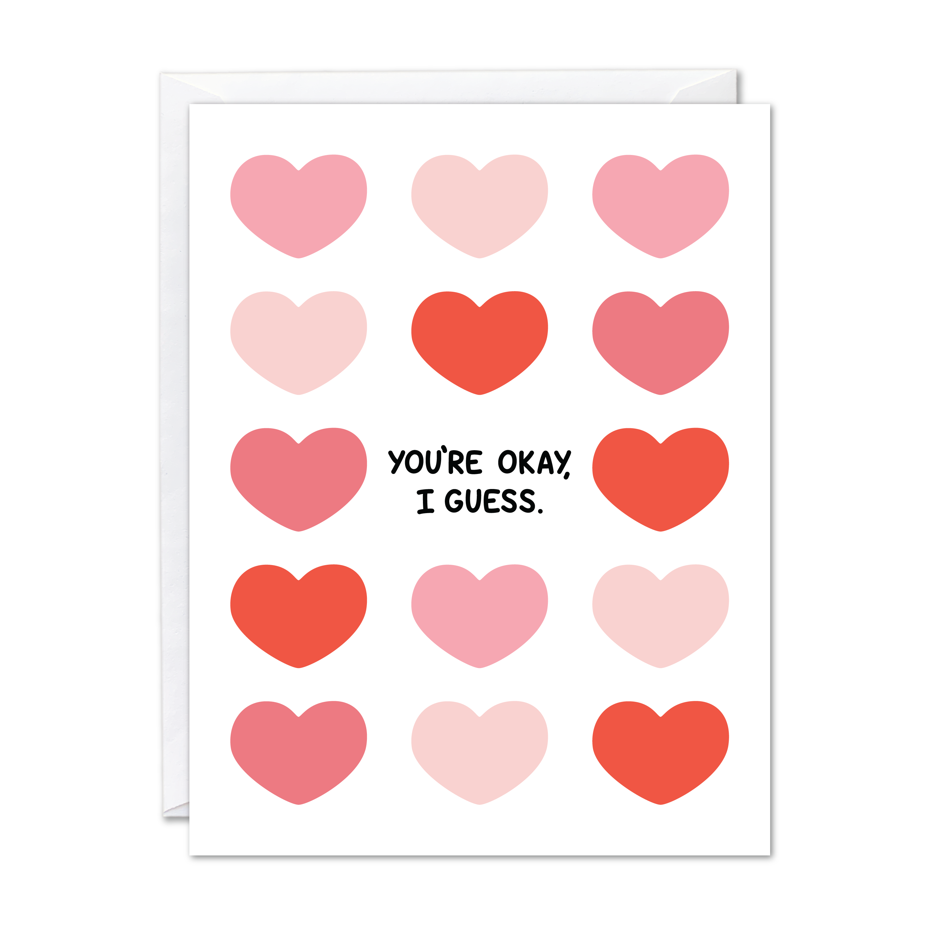 White greeting card with pink and red hearts and the phrase "you're okay, I guess." Paired with a white envelope.