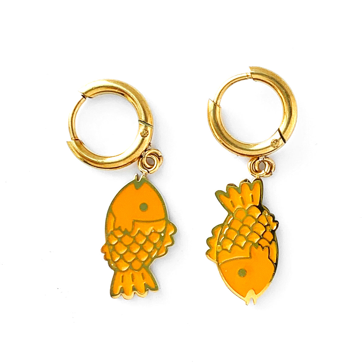 Small gold hoop earrings with charms of a taiyaki fish in opposing directions